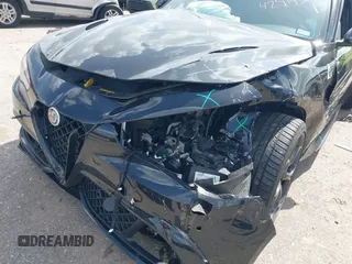 2023 Alfa Romeo Giulia Quadrifoglio with VIN ZARFAMEV9P7674979, listed as a IAAI auction lot 42514383 with 19,226 mi miles and . Bid and sale history available at DreamBid. Image 6.
