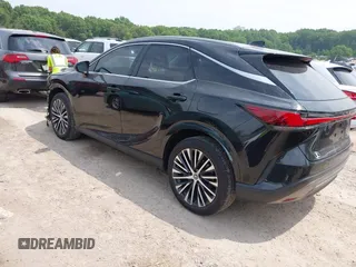 2023 Lexus RX 350 with VIN 2T2BAMCA6PC021707, listed as a IAAI auction lot 42487717 with 30,008 mi miles and . Bid and sale history available at DreamBid. Image 3.
