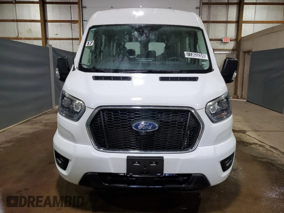 2023 Ford Transit Passenger XL with VIN 1FBAX2C86PKB28288, listed as a Copart auction lot 77303204 with 31,380 mi miles and Clean Title. Bid and sale history available at carsss.com. Image 5.