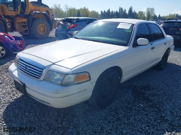 1999 Ford Crown Victoria LX with VIN 2FAFP74W7XX185341, listed as a IAAI auction lot 42020186 with 178,997 mi miles. Bid and sale history available at carsss.com. Image 2.
