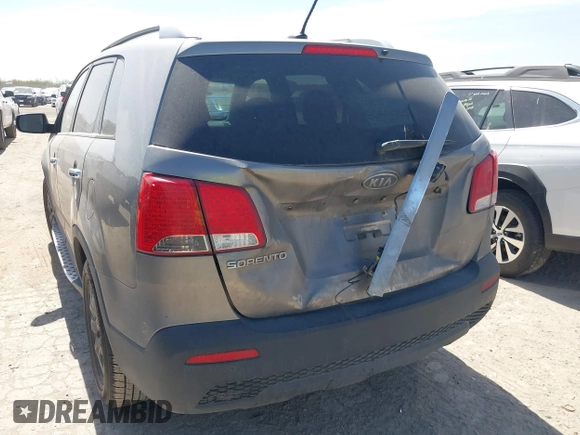 2013 Kia Sorento LX with VIN 5XYKTDA69DG360796, listed as a IAAI auction lot 41735901 with 216,875 mi miles. Bid and sale history available at carsss.com. Image 6.