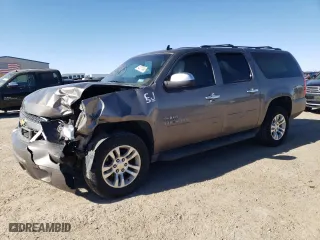 2013 Chevrolet Suburban LS with VIN 1GNSCHE01DR323733, listed as a Copart auction lot 42207495 with 147,072 mi miles and Salvage Title. Bid and sale history available at carsss.com. Image 1.