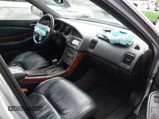 1999 Acura TL with VIN 19UUA5657XA021688, listed as a IAAI auction lot 41997466 with 241,232 mi miles. Bid and sale history available at carsss.com. Image 5.