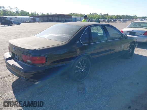 1996 Chevrolet Caprice 1SA Special Value z VIN 1G1BL52PXTR141223, wystawiony jako IAAI lot #41693524 z przebiegiem Nie podano mil oraz . Historia ofert i sprzedaży dostępna na DreamBid. Obrazek 4.