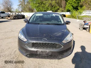 2018 Ford Focus SE z VIN 1FADP3FE4JL306237, wystawiony jako Copart lot #56482215 z przebiegiem 102 241 mil mil oraz Czysty tytuł • Clean title. Historia ofert i sprzedaży dostępna na DreamBid. Obrazek 5.