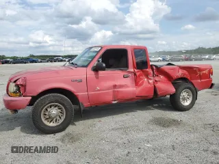 1999 Ford Ranger XL with VIN 1FTYR14V1XTA40892, listed as a Copart auction lot 60829145 with 221,088 mi miles and Salvage title. Bid and sale history available at DreamBid. Image 1.