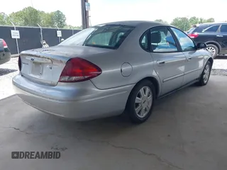 2005 Ford Taurus SEL with VIN 1FAFP56235A209879, listed as a IAAI auction lot 42537452 with 231,151 mi miles and . Bid and sale history available at DreamBid. Image 4.