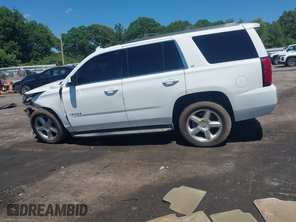 2015 Chevrolet Tahoe LT with VIN 1GNSCBKC4FR648715, listed as a IAAI auction lot 42267719 with Not provided miles and . Bid and sale history available at DreamBid. Image 14.