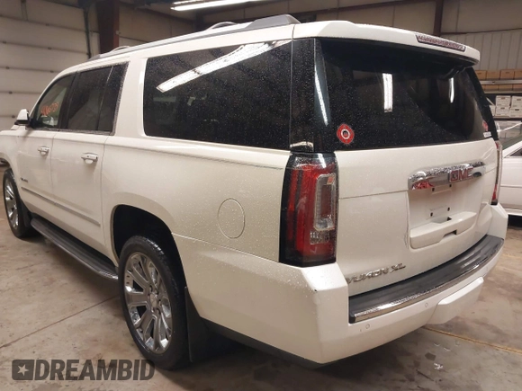 2015 GMC Yukon XL Denali with VIN 1GKS2JKJ1FR635901, listed as a IAAI auction lot 41805739 with 120,998 mi miles and . Bid and sale history available at carsss.com. Image 3.