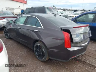 2014 Cadillac ATS Standard RWD with VIN 1G6AA5RX9E0101644, listed as a IAAI auction lot 42333033 with Not provided miles and . Bid and sale history available at DreamBid. Image 3.