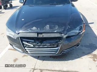 2011 Audi A8 with VIN WAUAVAFD5BN022388, listed as a IAAI auction lot 42102765 with 141,865 mi miles and . Bid and sale history available at DreamBid. Image 6.