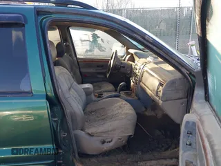 1999 Jeep Grand Cherokee Limited with VIN 1J4GW68S1XC555399, listed as a IAAI auction lot 41764099 with 1 mi miles. Bid and sale history available at carsss.com. Image 5.