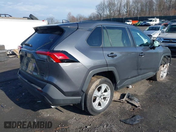 2020 Toyota RAV4 XLE with VIN 2T3P1RFV2LW130185, listed as a IAAI auction lot 42033372 with 98,667 mi miles and . Bid and sale history available at DreamBid. Image 4.