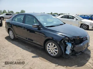 2013 Volkswagen Jetta SE with VIN 3VWDX7AJ4DM257210, listed as a Copart auction lot 61043365 with 85,166 mi miles and Salvage title. Bid and sale history available at DreamBid. Image 4.