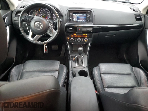 2015 Mazda CX-5 Grand Touring with VIN JM3KE2DY4F0526671, listed as a Copart auction lot 46520505 with 129,017 mi miles and Salvage Title. Bid and sale history available at carsss.com. Image 8.