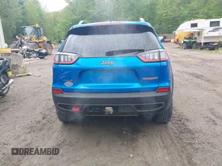2021 Jeep Cherokee Trailhawk with VIN 1C4PJMBXXMD173102, listed as a IAAI auction lot 42205402 with 57,321 mi miles and . Bid and sale history available at DreamBid. Image 17.