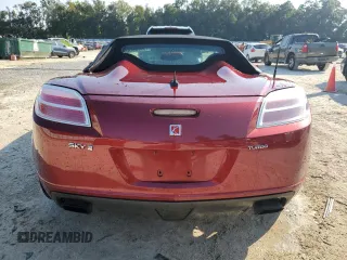 2009 Saturn Sky z VIN 1G8MH35X99Y104867, wystawiony jako Copart lot #76470274 z przebiegiem Nie podano mil oraz Szkody całkowita. Historia ofert i sprzedaży dostępna na DreamBid. Obrazek 6.
