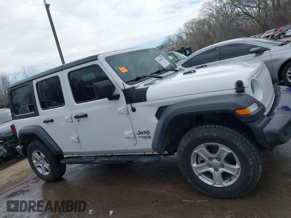 2018 Jeep Wrangler Unlimited Sport z VIN 1C4HJXDN3JW142453, wystawiony jako IAAI lot #41889589 z przebiegiem 53 693 mil mil oraz . Historia ofert i sprzedaży dostępna na DreamBid. Obrazek 13.