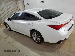 2021 Toyota Avalon XLE z VIN 4T1AZ1FB0MU060010, wystawiony jako Copart lot #56844085 z przebiegiem 115 788 mil mil oraz Czysty tytuł • Clean title. Historia ofert i sprzedaży dostępna na DreamBid. Obrazek 2.