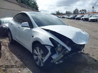 2023 Tesla Model Y Long Range with VIN 7SAYGDEEXPA149358, listed as a IAAI auction lot 41512878 with 25,678 mi miles and . Bid and sale history available at DreamBid. Image 1.