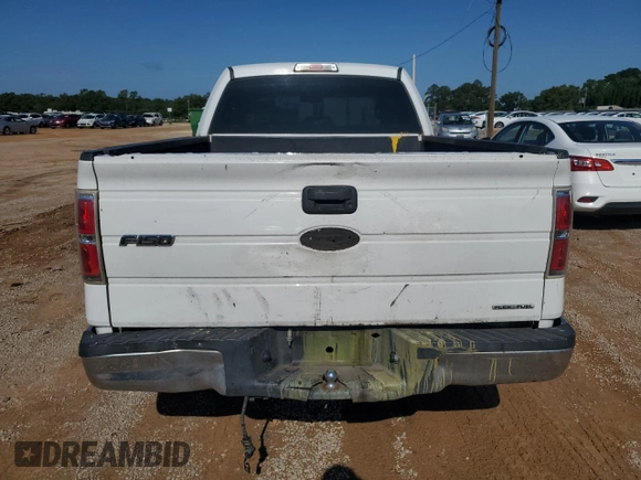 2011 Ford F-150 XL with VIN 1FTFW1CF9BFB71523, listed as a Copart auction lot 59009745 with 241,876 mi miles and Salvage title. Bid and sale history available at DreamBid. Image 6.