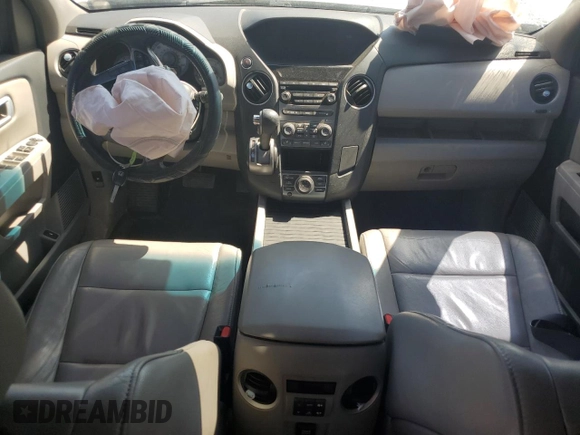2014 Honda Pilot EX-L with VIN 5FNYF3H74EB009619, listed as a Copart auction lot 52297465 with 193,923 mi miles and Salvage Title. Bid and sale history available at DreamBid. Image 8.