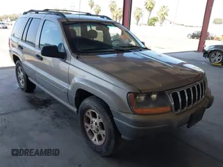 2000 Jeep Grand Cherokee Laredo with VIN 1J4G248S4YC145343, listed as a IAAI auction lot 42196774 with 175,026 mi miles and . Bid and sale history available at DreamBid. Image 1.