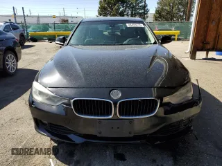 2014 BMW 3 Series 335i xDrive with VIN WBA3B9G53ENR90601, listed as a Copart auction lot 48493275 with 129,992 mi miles and Salvage Title. Bid and sale history available at carsss.com. Image 5.