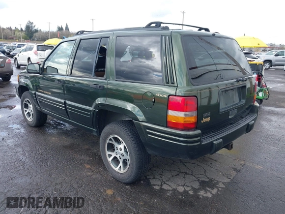 1996 Jeep Grand Cherokee Limited with VIN 1J4GZ78S0TC235692, listed as a IAAI auction lot 41945617 with Not provided miles and . Bid and sale history available at DreamBid. Image 3.