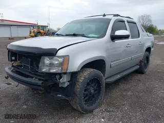 2011 Chevrolet Avalanche LT with VIN 3GNTKFE39BG212642, listed as a IAAI auction lot 41951335 with 221,950 mi miles. Bid and sale history available at carsss.com. Image 2.