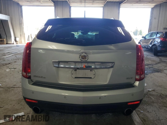 2014 Cadillac SRX Performance Collection with VIN 3GYFNFE30ES680042, listed as a Copart auction lot 56765445 with 91,174 mi miles and Non repairable. Bid and sale history available at DreamBid. Image 6.