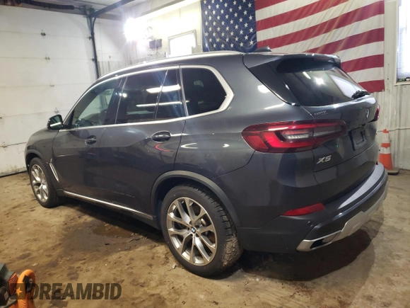 2021 BMW X5 xDrive40i with VIN 5UXCR6C06M9E05140, listed as a Copart auction lot 52402475 with 47,869 mi miles and Salvage title. Bid and sale history available at DreamBid. Image 2.