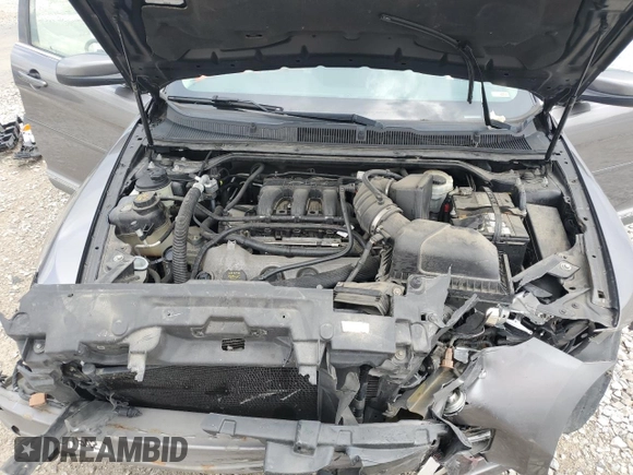 2011 Ford Taurus SEL z VIN 1FAHP2EWXBG190610, wystawiony jako Copart lot #56993785 z przebiegiem 119 784 mil mil oraz Szkoda całkowita • Salvage title. Historia ofert i sprzedaży dostępna na DreamBid. Obrazek 11.