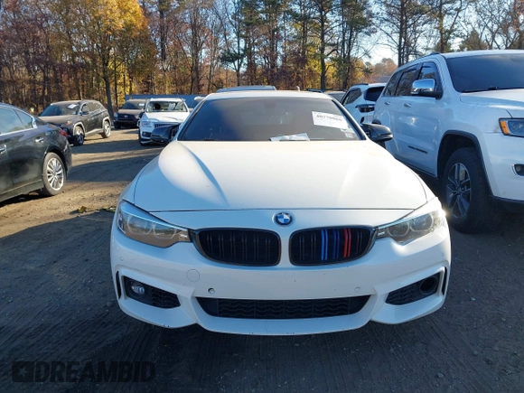 2019 BMW 4 Series 440i xDrive with VIN WBA4J7C57KBM74773, listed as a IAAI auction lot 40770866 with 79,382 mi miles and . Bid and sale history available at carsss.com. Image 12.