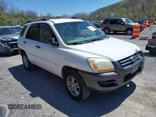2006 Kia Sportage LX with VIN KNDJF723567151614, listed as a IAAI auction lot 42022102 with 128,564 mi miles and . Bid and sale history available at carsss.com. Image 1.