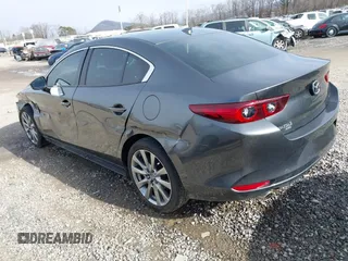 2023 Mazda 3 S Premium with VIN 3MZBPBDM8PM373434, listed as a IAAI auction lot 41234729 with 9,387 mi miles and . Bid and sale history available at DreamBid. Image 3.