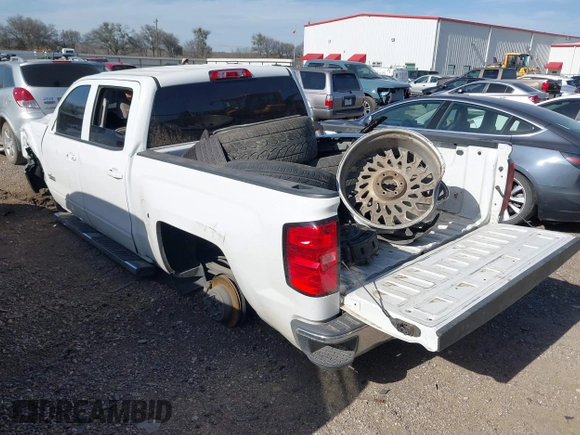 2018 Chevrolet Silverado 1500 LT with VIN 3GCUCRER0JG286336, listed as a IAAI auction lot 41738980 with 124,612 mi miles and . Bid and sale history available at DreamBid. Image 3.