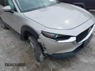 2024 Mazda CX-30 S Premium with VIN 3MVDMBDM1RM647840, listed as a IAAI auction lot 41724670 with 14,796 mi miles and . Bid and sale history available at DreamBid. Image 6.