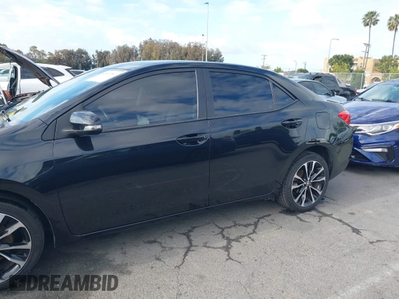 2019 Toyota Corolla L with VIN 5YFBURHE6KP892992, listed as a IAAI auction lot 42057187 with 80,304 mi miles and . Bid and sale history available at DreamBid. Image 14.