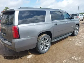 2018 Chevrolet Suburban LT with VIN 1GNSKHKC3JR207477, listed as a IAAI auction lot 41716372 with 168,601 mi miles. Bid and sale history available at carsss.com. Image 4.
