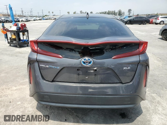 2022 Toyota Prius LE z VIN JTDKAMFP7N3210649, wystawiony jako Copart lot #55572175 z przebiegiem 40 565 mil mil oraz Szkoda całkowita • Salvage title. Historia ofert i sprzedaży dostępna na DreamBid. Obrazek 6.