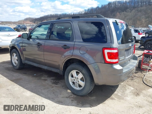 2012 Ford Escape XLT with VIN 1FMCU0D76CKC01916, listed as a IAAI auction lot 41879331 with 194,201 mi miles. Bid and sale history available at carsss.com. Image 3.