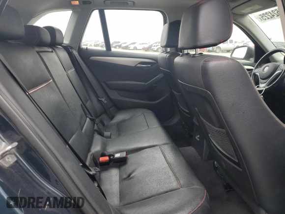 2013 BMW X1 xDrive28i z VIN WBAVL1C5XDVR85326, wystawiony jako Copart lot #58524225 z przebiegiem 138 389 mil mil oraz Szkoda całkowita • Salvage title. Historia ofert i sprzedaży dostępna na DreamBid. Obrazek 11.