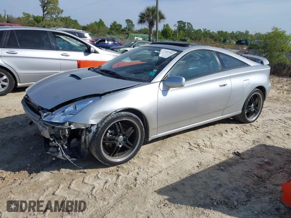 2002 Toyota Celica GT with VIN JTDDR32TX20129902, listed as a IAAI auction lot 41443750 with 203,652 mi miles. Bid and sale history available at carsss.com. Image 2.
