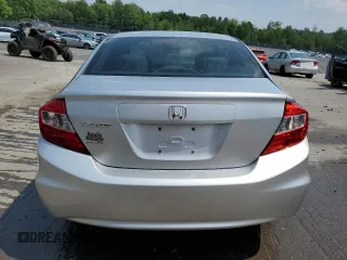 2012 Honda Civic LX с VIN 19XFB2F5XCE348936, выставлен на аукционе Copart как лот 60262265 с пробегом 199 721 миль миль и Списание • Salvage title. История ставок и продаж доступна на DreamBid. Изображение 6.