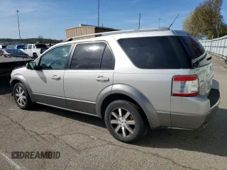 2008 Ford Taurus X SEL with VIN 1FMDK02W28GA05793, listed as a Copart auction lot 52317125 with 158,271 mi miles and Salvage title. Bid and sale history available at DreamBid. Image 2.