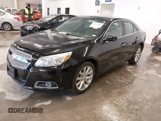 2013 Chevrolet Malibu LTZ with VIN 1G11H5SA1DU129095, listed as a IAAI auction lot 41556006 with 170,477 mi miles and . Bid and sale history available at DreamBid. Image 20.
