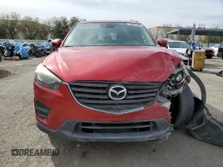 2016 Mazda CX-5 Grand Touring with VIN JM3KE4DY0G0820954, listed as a Copart auction lot 48027785 with 152,448 mi miles and Salvage Title. Bid and sale history available at carsss.com. Image 5.