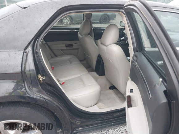 2005 Chrysler 300 with VIN 2C3JA63H05H608145, listed as a IAAI auction lot 42075474 with 167,098 mi miles. Bid and sale history available at carsss.com. Image 8.