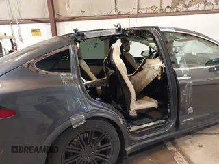 2016 Tesla Model X 70D with VIN 5YJXCBE2XGF025303, listed as a IAAI auction lot 41558869 with 77,793 mi miles and . Bid and sale history available at DreamBid. Image 6.